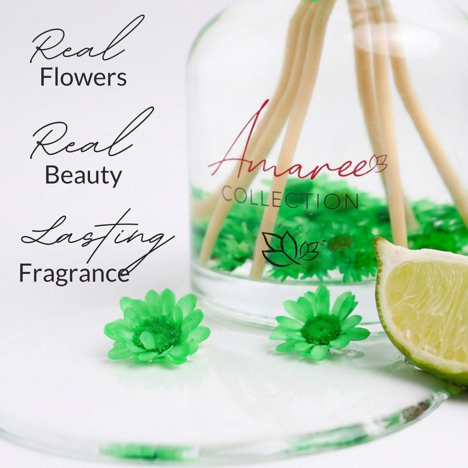 Glass diffuser with green flowers and lime wedge, featuring &
