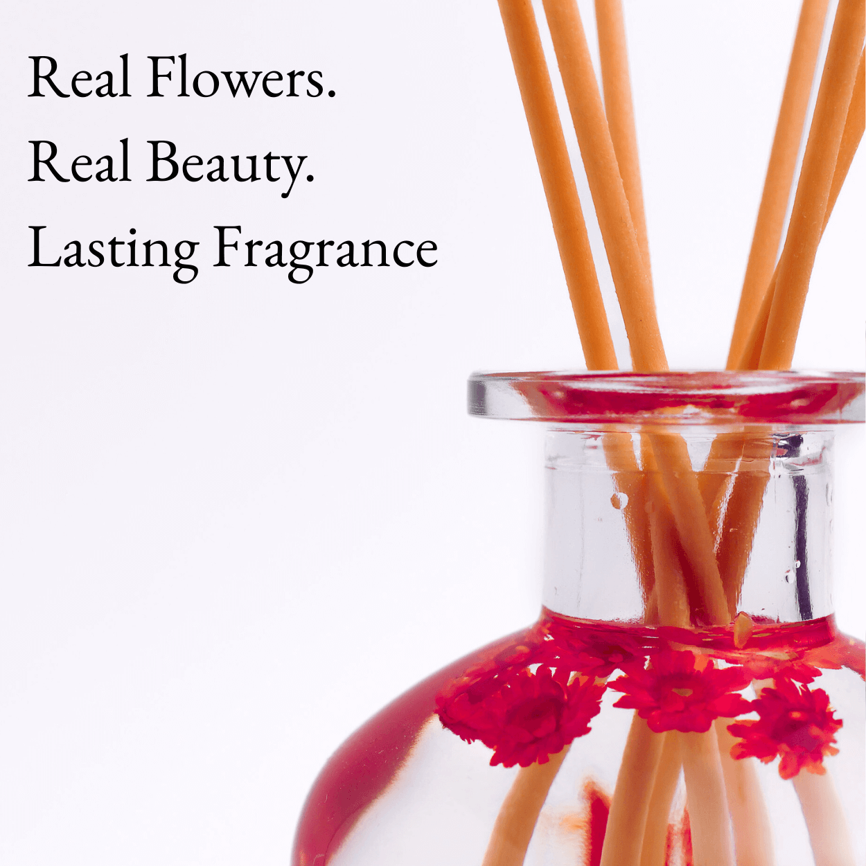 Black Raspberry & Vanilla Reed Diffuser 250ml with decorative sticks and floral accents, enhancing any space.