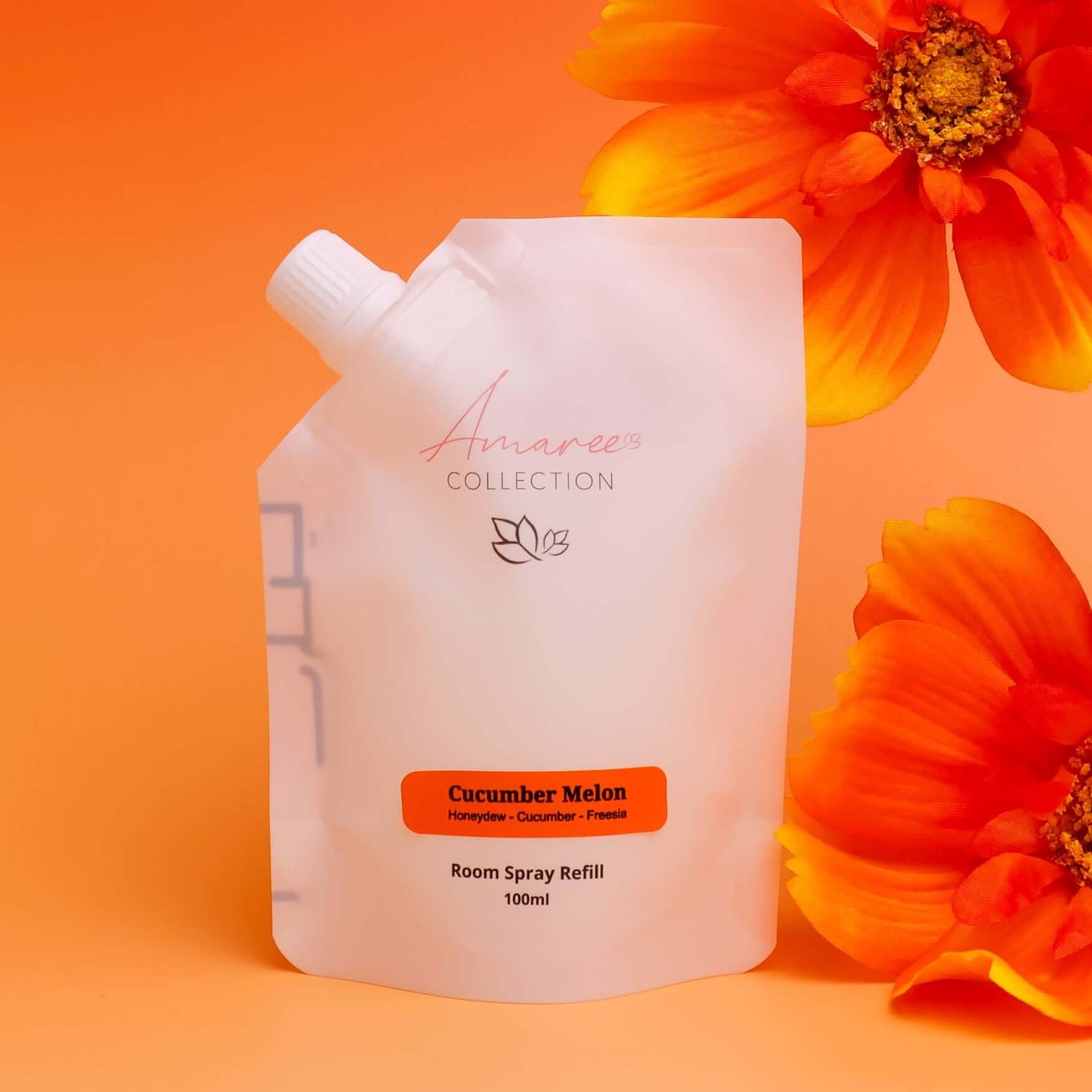 Cucumber Melon Room Spray Refill 100ml in a pouch with flowers, fresh and light scent for home fragrance.
