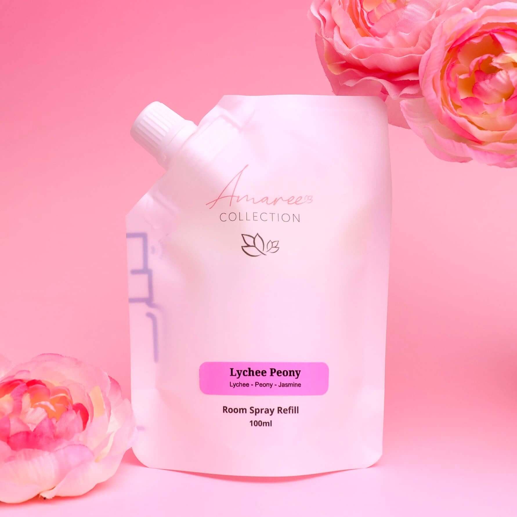 Lychee Peony Room Spray Refill 100ml in a stylish pouch with floral background, perfect for a fresh home scent.