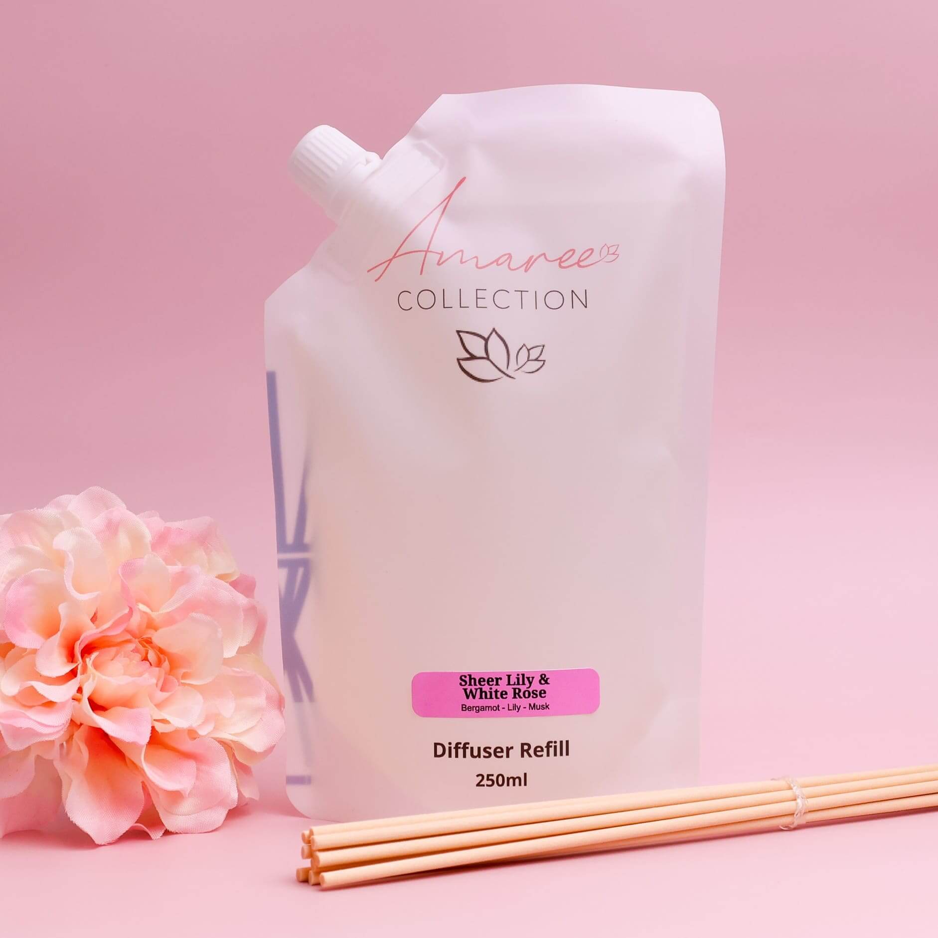 Sheer Lily & White Rose Reed Diffuser Refill 250ml packaging with floral decoration and reed sticks