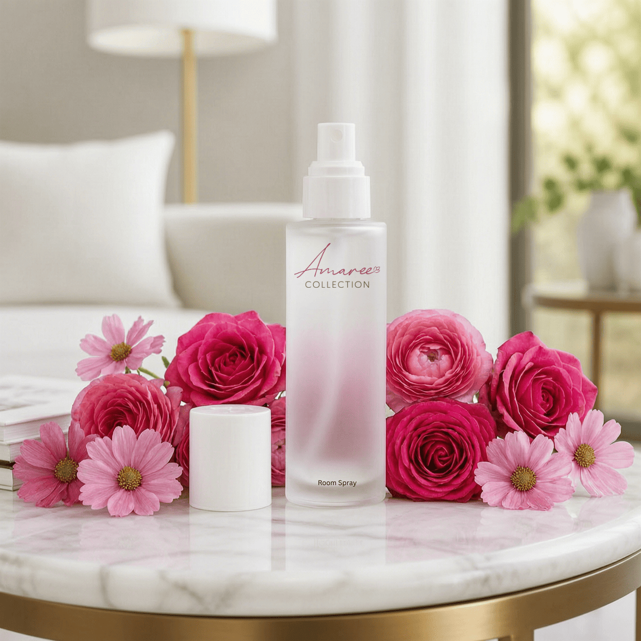 A frosted glass room spray bottle labeled &