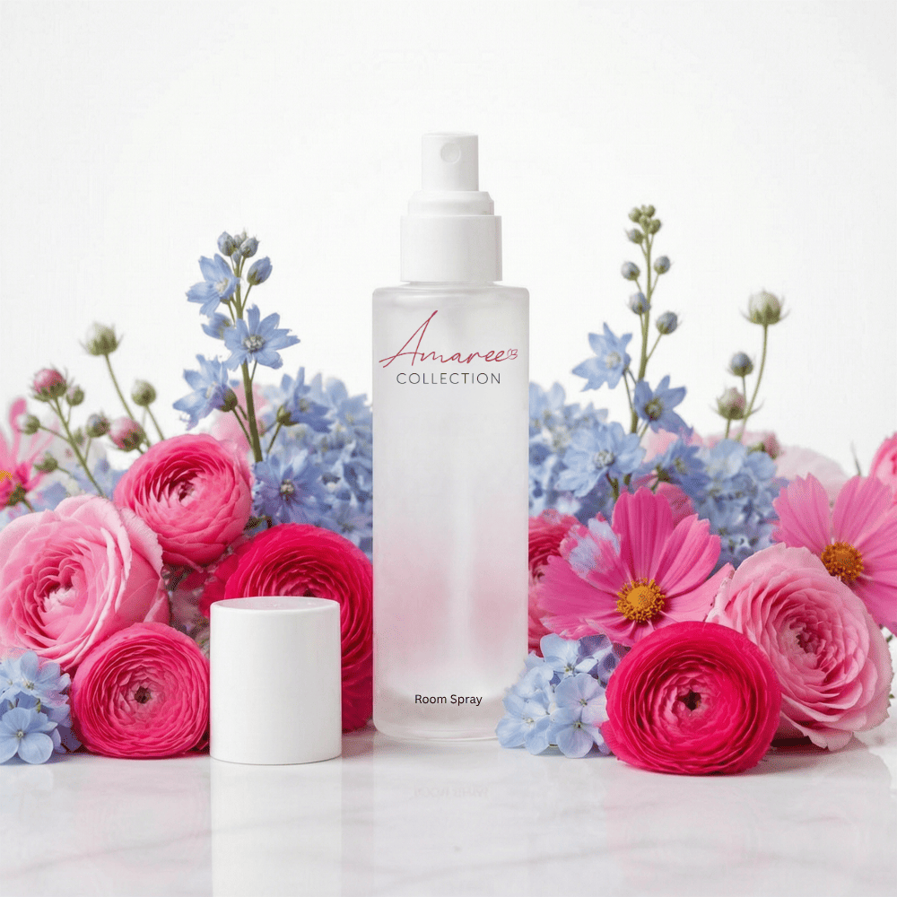 A frosted glass room spray bottle labeled &