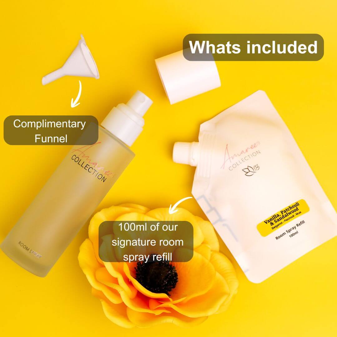 Vanilla Patchouli & Sandalwood Room Spray Refill 100ml including funnel and refill package on bright background.