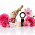 A perfume bottle labeled &