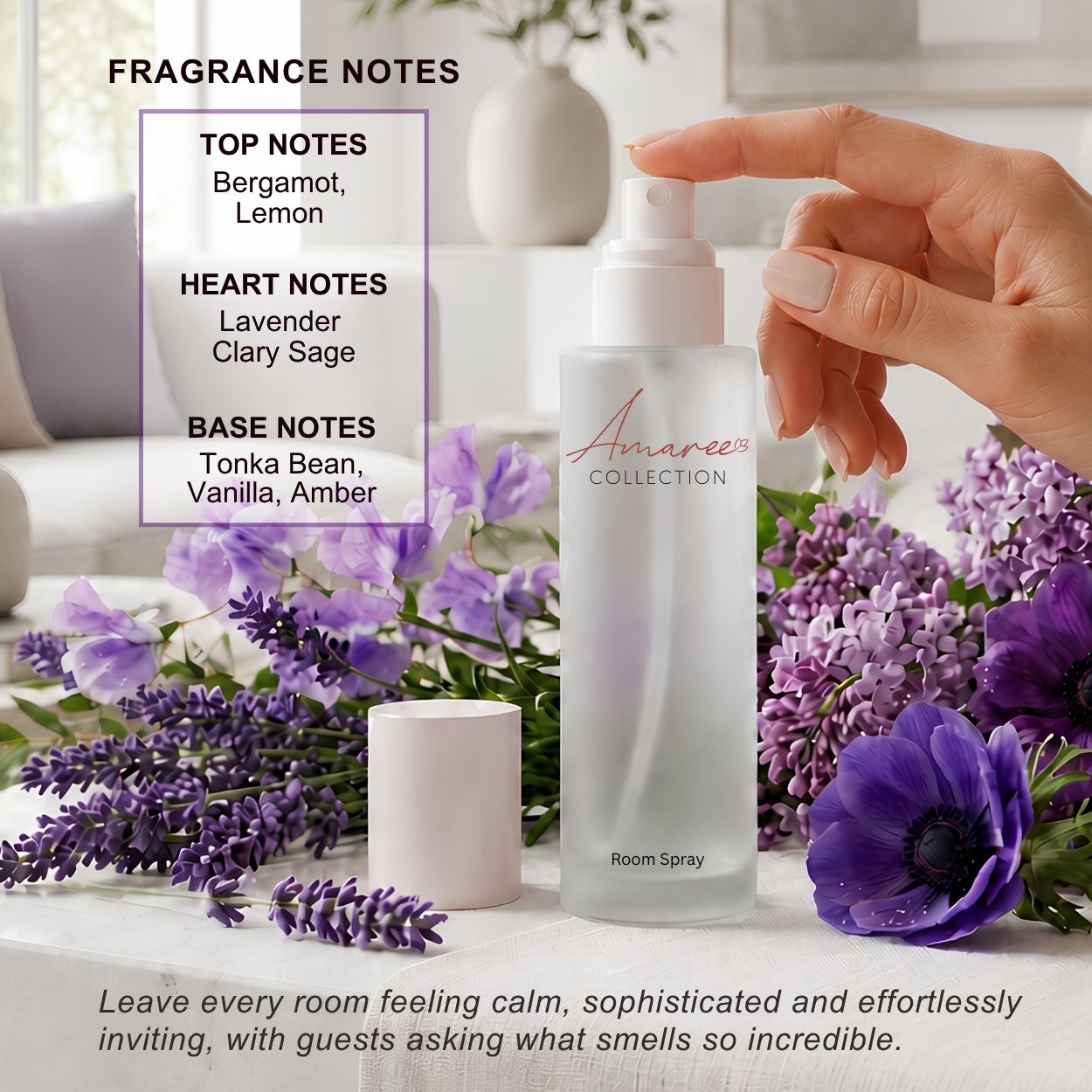 A hand pumps the spray top of a frosted cylindrical room spray bottle labeled &