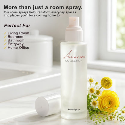 A frosted glass room spray bottle labeled &