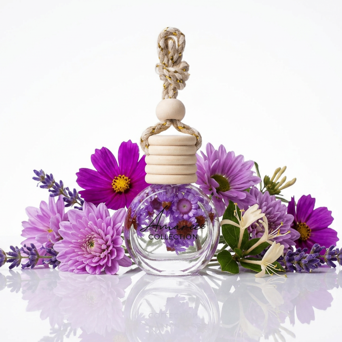 Perfume bottle with wooden cap surrounded by purple flowers on a white background