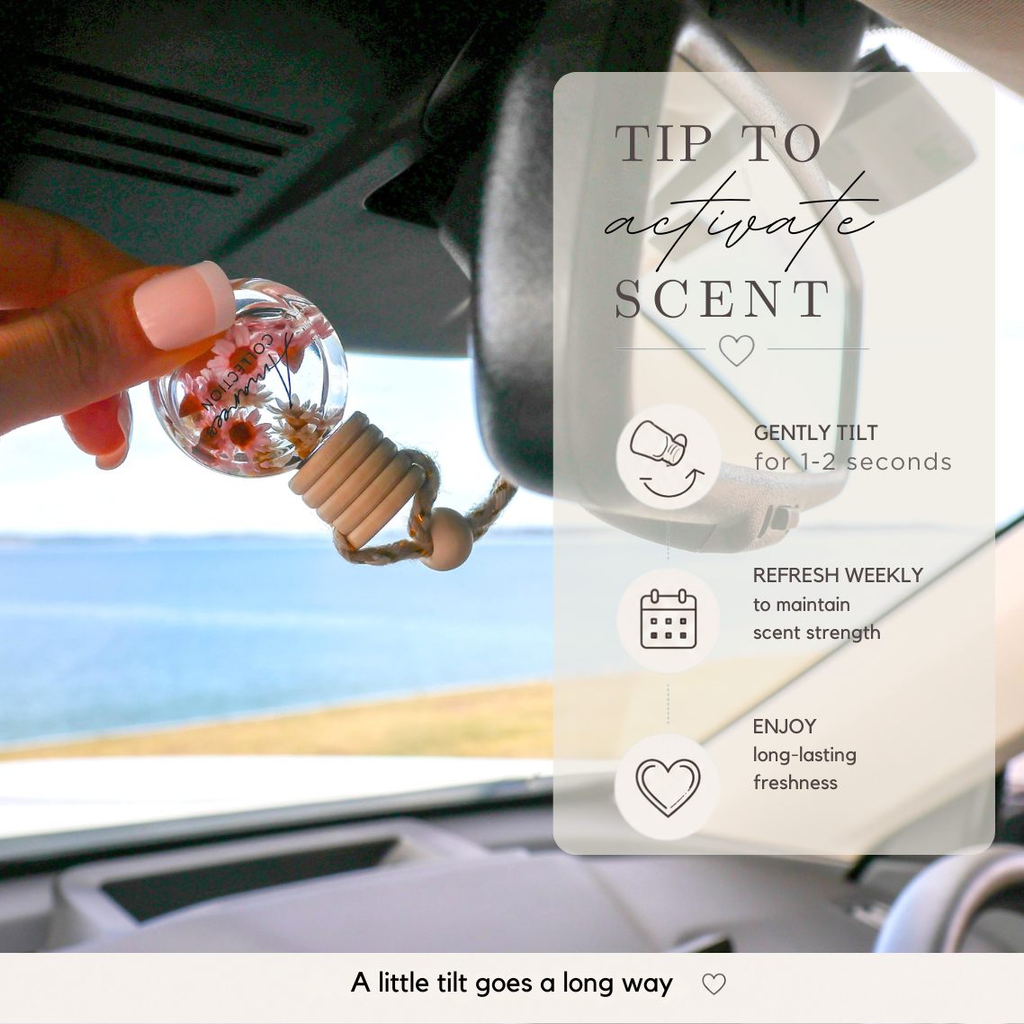 Car air freshener with a hand holding it, displayed in a car interior.
