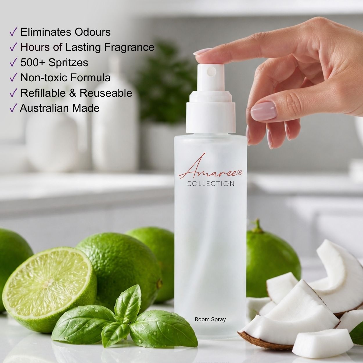 A frosted glass room spray bottle labeled &