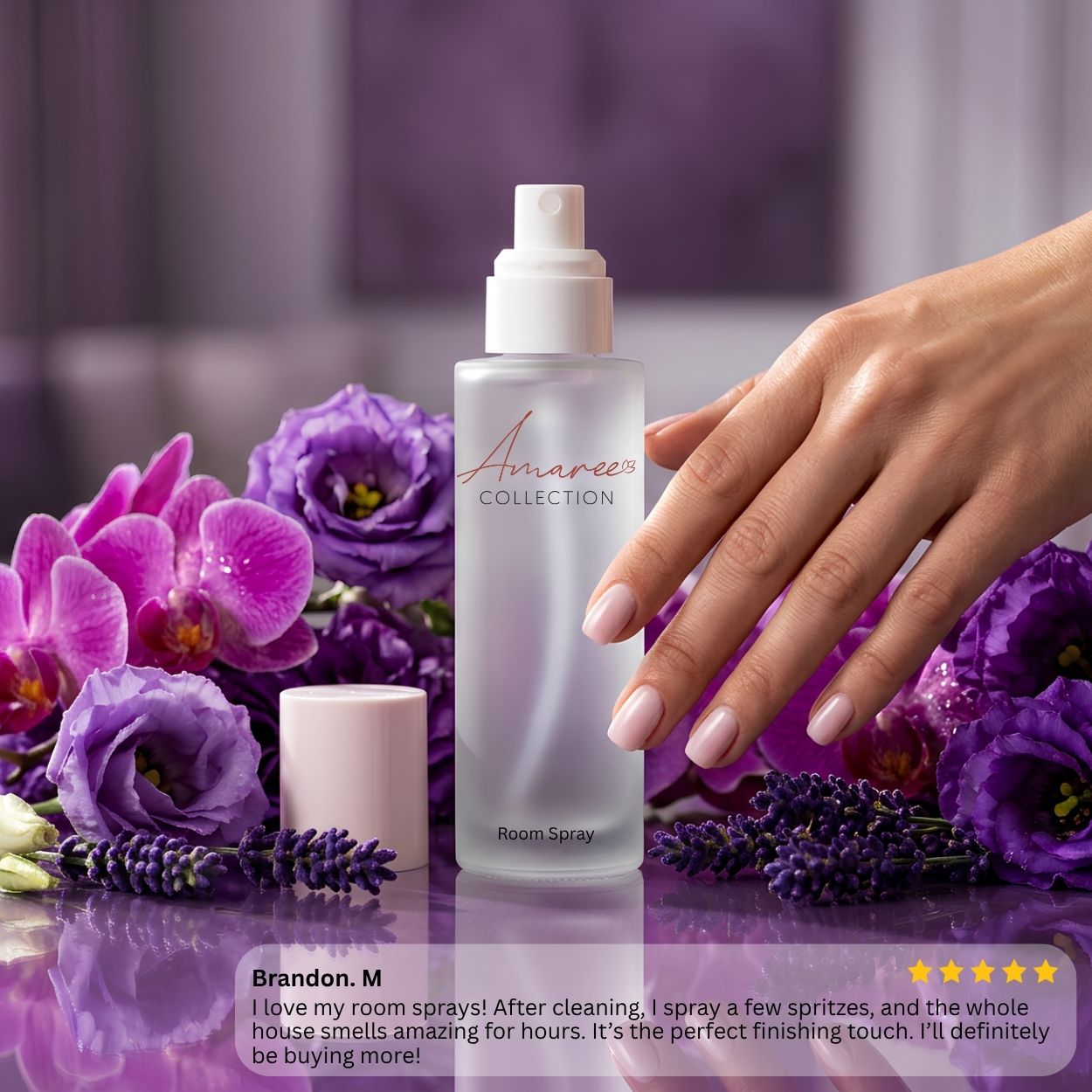 A frosted room spray bottle labeled &