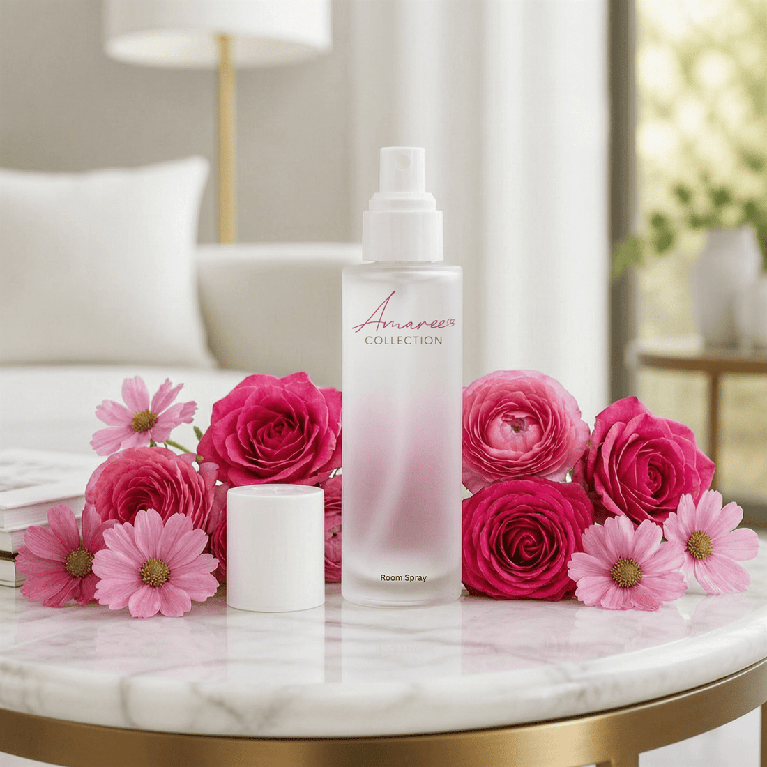 A frosted glass room spray bottle labeled &
