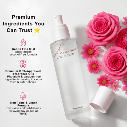 A bottle of Amaree Collection room spray with its cap off, styled with pink roses and daisies on a white background, accompanied by marketing text highlighting premium ingredients.