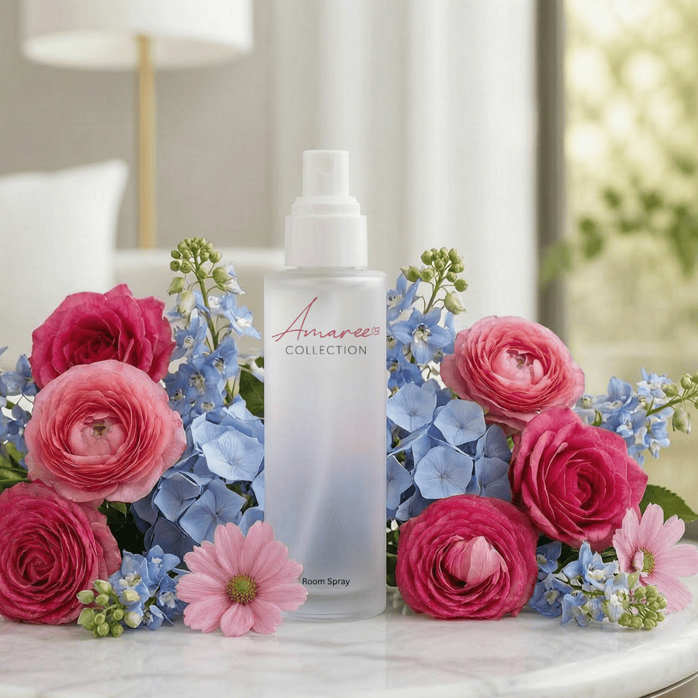A frosted glass spray bottle labeled &
