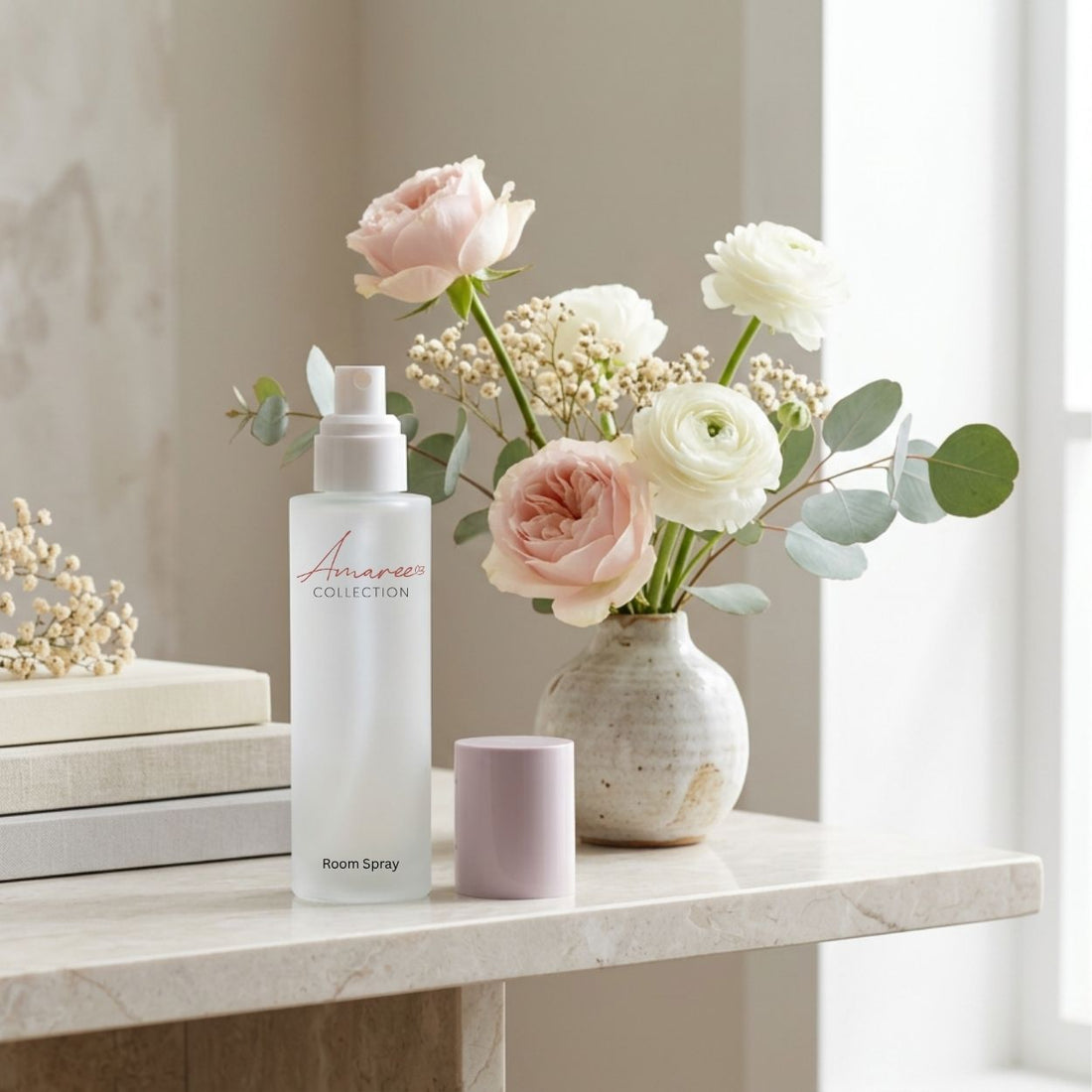 A white room spray bottle labeled &