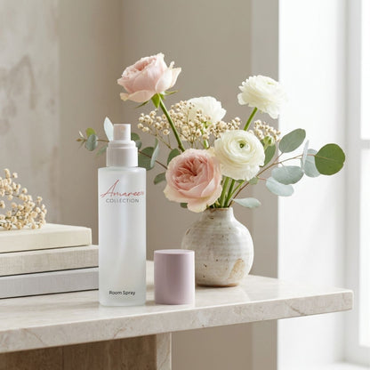 A white room spray bottle labeled &