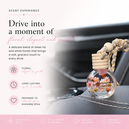 Car air freshener with floral design and text describing its features