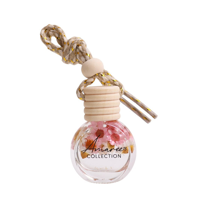 car diffuser with pink and white flowers